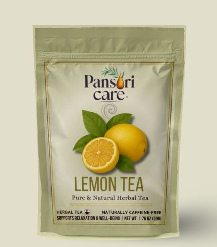 Pansari Care Lemon Tea in a clear glass mug, with dried lemon slices and fresh lemons.
