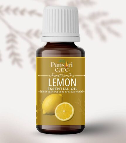 Pansari Care Lemon Essential Oil bottle with fresh yellow lemons and a pile of lemon peels.
