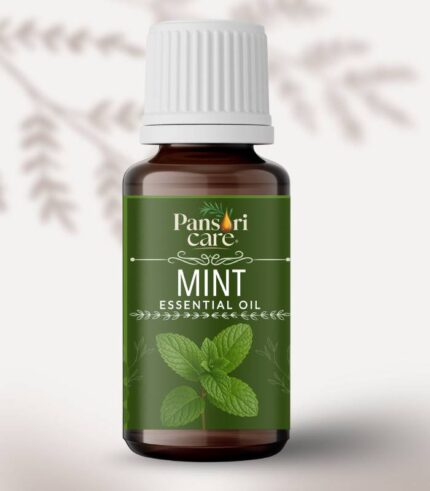 Pansari Care Mint Essential Oil bottle with fresh green spearmint leaves.