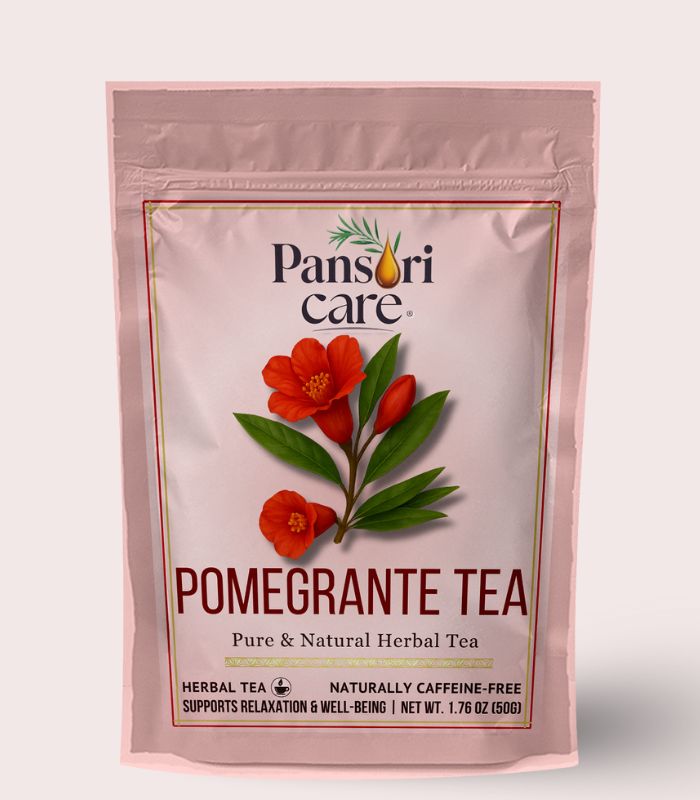 3 Pansari Care Pomegranate Tea in a glass teapot, with dried pomegranate peels and fresh pomegranate arils.