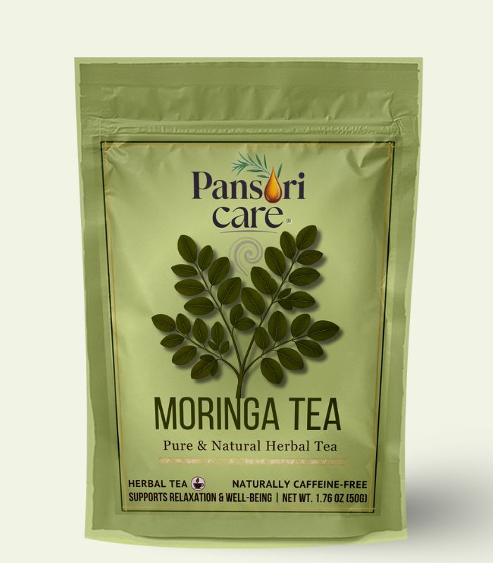 4 Pansari Care Moringa Tea in a cup, with dried moringa leaves and powder.