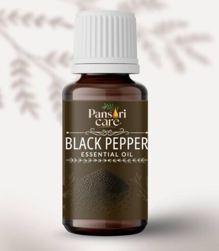 Pansari Care Black Pepper Essential Oil bottle with whole black peppercorns.