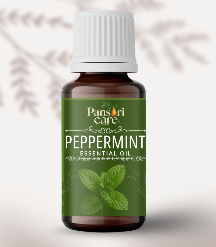 Pansari Care Peppermint Essential Oil bottle with fresh peppermint leaves. Pansari Care Peppermint Essential Oil bottle with fresh peppermint leaves.