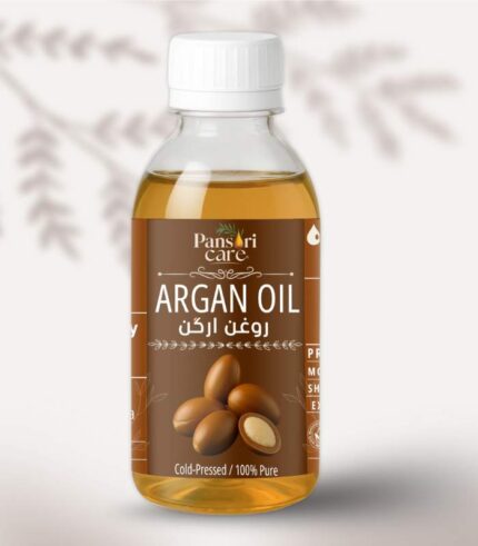 Pansari Care Argan Oil bottle with Argan nuts and a single droplet of oil.