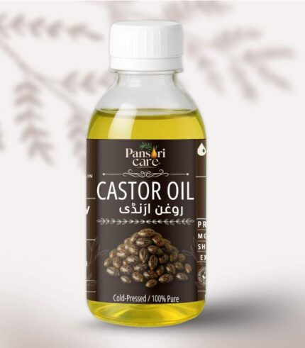Pansari Care Castor Oil bottle with castor seeds and a thick drop of oil.
