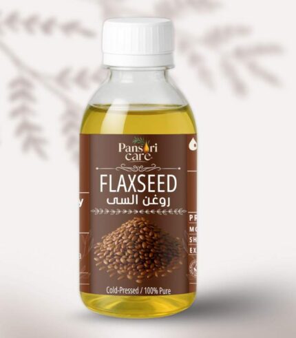Pansari Care Flaxseed Oil bottle with flaxseeds and a bowl of the oil.