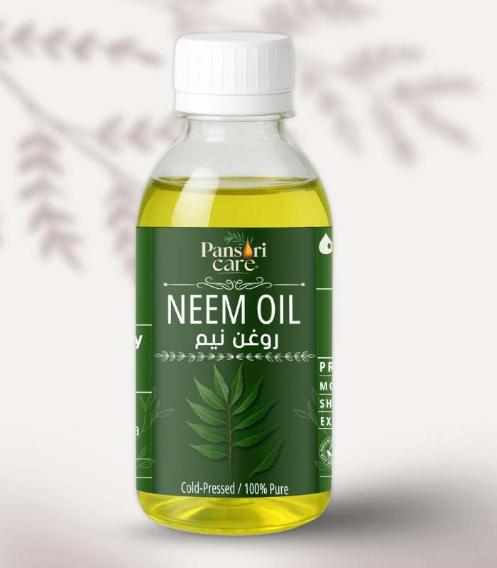 neem Pansari Care Neem Oil bottle with fresh neem leaves and neem seeds