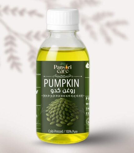 Pansari Care Pumpkin Seed Oil bottle with fresh pumpkin seeds and a slice of pumpkin.