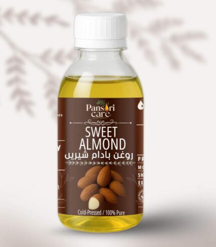 Pansari Care Sweet Almond Oil bottle with fresh almonds in their shells and shelled almonds.